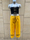 PANTALÓN BAKA AMARILLO LETRAS NEGRAS