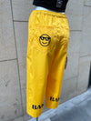 PANTALÓN BAKA AMARILLO LETRAS NEGRAS